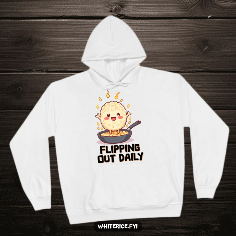 Funny rice grain character energetically flipping food in a pan, featured on a cozy funny hoodie.