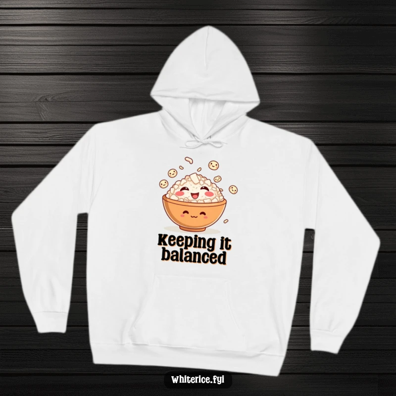 Funny hoodie featuring a giggling rice bowl character skillfully juggling smiling grains of rice, designed for ultimate comfort.
