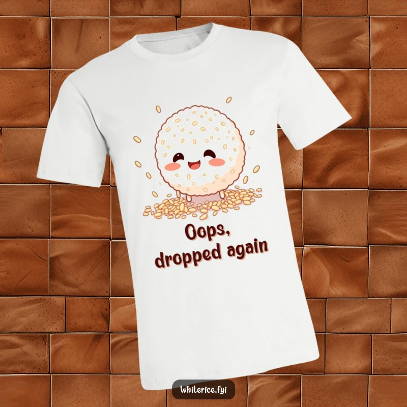 Funny t-shirt depicting a happy rice ball character in a comical attempt to catch falling grains, showcasing relatable clumsiness.