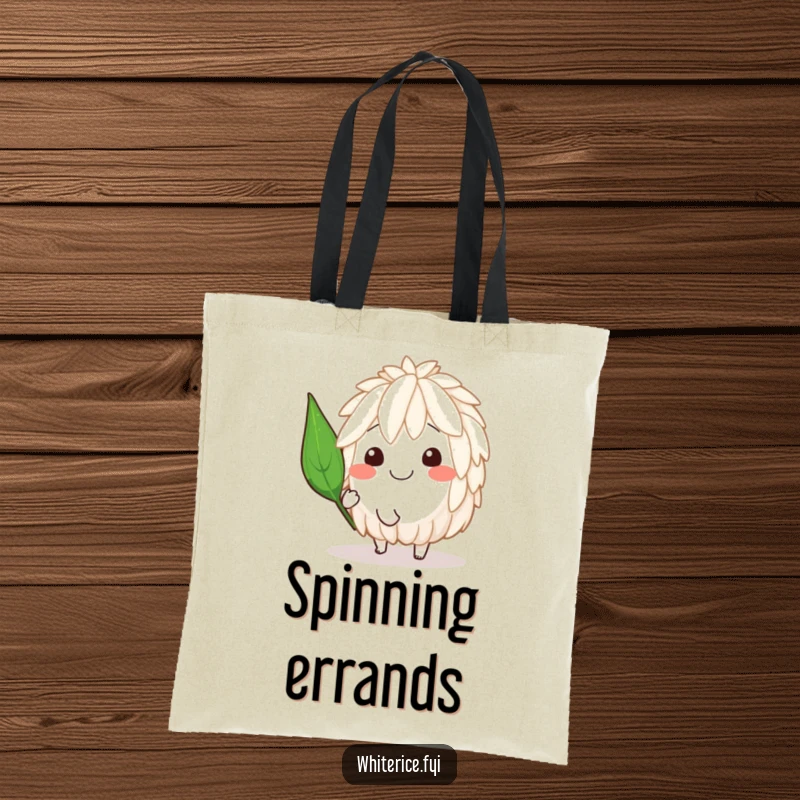 Funny tote bag showing a smiling rice character mid-spin with a jaunty leaf, a symbol of playful energy.